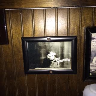 A bulldog/sailor wishing you a pleasant poo at Miles.