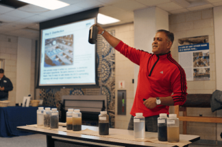 Plant Superintendent Zainool Ali demonstrates the lifecycle of our sewage