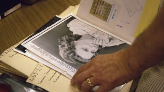 A glimpse into an old folder in The New York Times morgue. Courtesy of Kino Lorber.